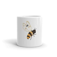 White ceramic "RIF Queen Bee" coffee mug. Vintage washed black and yellow design. 11oz cup by Roast In Focus.