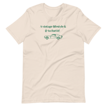 Off White "A vintage lifestyle & coffee to fuel it!" motto t-shirt. Old school green design. Comfortable cotton unisex tee by Roast In Focus.