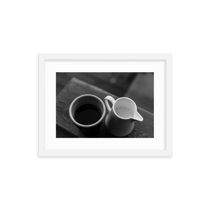 Framed Black & White Photo Print Poster "Yin & Yang". Shows coffee and milk as ying and yang. Photography by Jacob Sellström. Printed on matte paper with wooden frame. Two sizes: 8x10, 12x16.