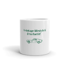 White ceramic "A vintage lifestyle & coffee to fuel it!" motto coffee mug. Old school green design. 11oz cup by Roast In Focus.